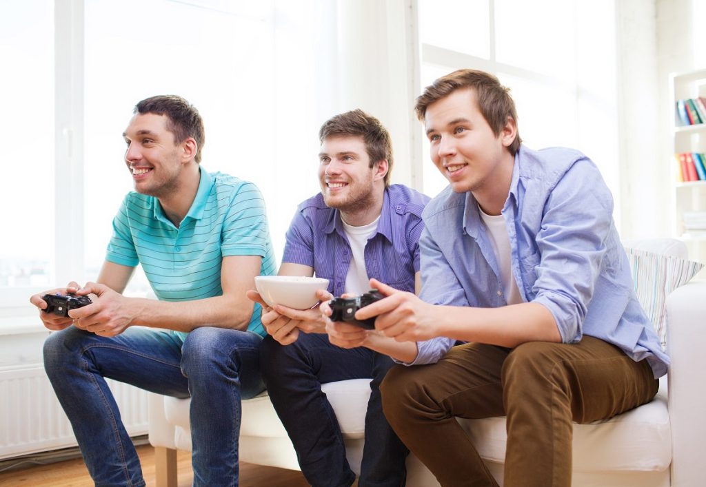 three men playing video games